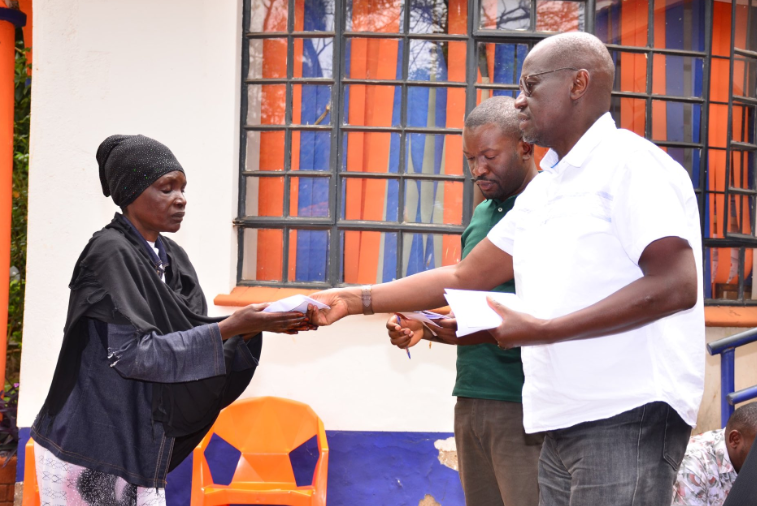 ODM party leaders with grieving families.